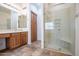 Spa-like bathroom with a large shower and modern vanity at 16068 W Edgemont Ave, Goodyear, AZ 85395