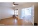 Bedroom with wood window shutters and ceiling fan at 16068 W Edgemont Ave, Goodyear, AZ 85395