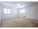 Spacious bedroom with carpet and ceiling fan at 16068 W Edgemont Ave, Goodyear, AZ 85395