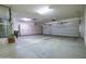 Two-car garage with built-in storage cabinets at 16068 W Edgemont Ave, Goodyear, AZ 85395