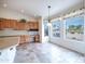 Kitchen features a breakfast nook with views, and lots of light at 16068 W Edgemont Ave, Goodyear, AZ 85395