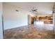Living room with open concept to kitchen area at 16068 W Edgemont Ave, Goodyear, AZ 85395