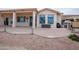 Covered patio with brick pavers and built in grill at 16068 W Edgemont Ave, Goodyear, AZ 85395