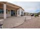 Large covered patio with access to the backyard at 16068 W Edgemont Ave, Goodyear, AZ 85395