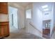 Upper hallway with access to bedrooms and stairs at 16068 W Edgemont Ave, Goodyear, AZ 85395