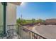 Balcony with seating and a view of the surrounding community and distant mountains at 2030 E Michigan Ave # 4, Phoenix, AZ 85022