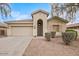 Charming single-story home with a two-car garage and desert landscaping at 2494 E Dulcinea Trl, Casa Grande, AZ 85194
