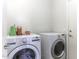 Laundry room with a front-loading washer and dryer at 3018 N Regal Ct, Casa Grande, AZ 85122