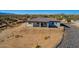 Aerial view of a one-story house with a covered patio and desert landscaping at 30605 N 172Nd St, Rio Verde, AZ 85263