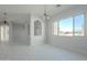 Open dining room features tile floors and an arched niche at 30605 N 172Nd St, Rio Verde, AZ 85263