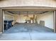 Two-car garage with storage shelves and bins at 3335 E San Angelo Ave, Gilbert, AZ 85234