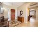 The foyer offers tile flooring, a charming wooden bench, and an eye-catching entryway at 3651 E Crest Ln, Phoenix, AZ 85050