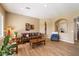 Cozy living area with wood-look flooring, southwestern decor, and plush furniture at 3651 E Crest Ln, Phoenix, AZ 85050