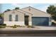 Charming single-story home with a two-car garage and landscaped front yard at 37374 W San Clemente St, Maricopa, AZ 85138