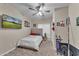 Simple bedroom with a ceiling fan and carpeted floors at 411 E Palomino Way, San Tan Valley, AZ 85143