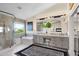 Spacious main bathroom with dual sink vanity, large shower, and separate bathtub at 4208 E Tether Trl, Phoenix, AZ 85050