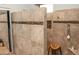 Walk-in shower with tiled walls and a built-in bench at 4889 S Nighthawk Dr, Gold Canyon, AZ 85118
