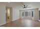 Main bedroom with bay window, hardwood floors, and ensuite bath at 501 E Desert Hills Estate Dr, Phoenix, AZ 85086
