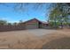 Single-story home with attached garage and desert landscaping at 501 E Desert Hills Estate Dr, Phoenix, AZ 85086