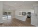 Spacious kitchen with island, stainless steel appliances, and hardwood floors at 501 E Desert Hills Estate Dr, Phoenix, AZ 85086