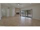 Living area with stone fireplace and access to backyard patio at 501 E Desert Hills Estate Dr, Phoenix, AZ 85086
