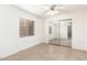 Simple bedroom with mirrored closet doors at 5606 N 75Th Dr, Glendale, AZ 85303