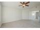 Guest bedroom with carpet flooring, ceiling fan, and neutral paint at 80 N Bradley Dr, Chandler, AZ 85226