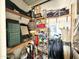 Storage shed with shelves, golf clubs, and other items at 822 S Beryl Dr, Apache Junction, AZ 85119