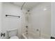 Bathroom with shower/tub combo, toilet, and towel rack at 8500 E Indian School Rd # 129, Scottsdale, AZ 85251
