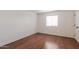 Cozy bedroom with hardwood floors and ample natural light at 8500 E Indian School Rd # 129, Scottsdale, AZ 85251