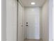 Entryway with tile flooring and closet at 8500 E Indian School Rd # 129, Scottsdale, AZ 85251