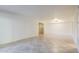 Spacious living room with tile flooring and neutral paint at 8500 E Indian School Rd # 129, Scottsdale, AZ 85251