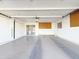 Attached garage offering extra storage and workshop area at 9457 W Newport Dr, Sun City, AZ 85351