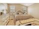 Cozy bedroom featuring a plush bed, elegant furnishings, and soft lighting at 10731 E Texas Ave, Mesa, AZ 85212