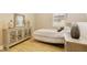 Well-appointed bedroom with a comfortable bed, stylish decor, and natural light at 10731 E Texas Ave, Mesa, AZ 85212
