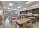 Craft room with work tables, storage cabinets, and ample workspace at 10731 E Texas Ave, Mesa, AZ 85212