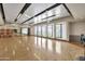 Fitness studio with wood floors, mirrors, and large windows for natural light at 10731 E Texas Ave, Mesa, AZ 85212
