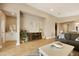 Inviting living room with a fireplace, comfortable seating, and stylish decor at 10731 E Texas Ave, Mesa, AZ 85212