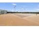 Lighted community tennis courts and surrounding trees at 10731 E Texas Ave, Mesa, AZ 85212