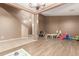 View of a foyer and staircase with wood-look flooring and tile at 1270 W Beacon Ct, Casa Grande, AZ 85122