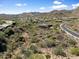 Scenic aerial view of desert landscape with homes and mountains at 14521 E Corrine Dr, Scottsdale, AZ 85259