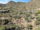 Elevated view of a sprawling desert landscape with scattered homes at 14521 E Corrine Dr, Scottsdale, AZ 85259