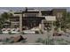 Modern home with pool, patio furniture, and desert landscaping at 14521 E Corrine Dr, Scottsdale, AZ 85259