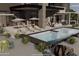 Inviting backyard oasis featuring a pool, lounge area, and desert landscaping at 14521 E Corrine Dr, Scottsdale, AZ 85259