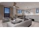 Open concept living room with stylish furniture, modern light fixtures, and a view at 14521 E Corrine Dr, Scottsdale, AZ 85259