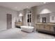 Modern bathroom featuring dual vanities, a freestanding tub, and contemporary fixtures at 14521 E Corrine Dr, Scottsdale, AZ 85259