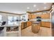 Spacious kitchen with island, stainless steel appliances, and ample cabinetry at 17774 W Parra Dr, Surprise, AZ 85387