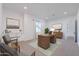 Home office space with built-in cabinets, desk, and windows for natural light at 1805 W Caramel Ct, Queen Creek, AZ 85144