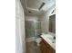 Bathroom with a shower/tub combo, single vanity, and tile flooring at 300 S 151St Ave, Goodyear, AZ 85338