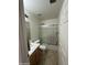 Clean and bright bathroom featuring a shower/tub combo and tile flooring at 300 S 151St Ave, Goodyear, AZ 85338